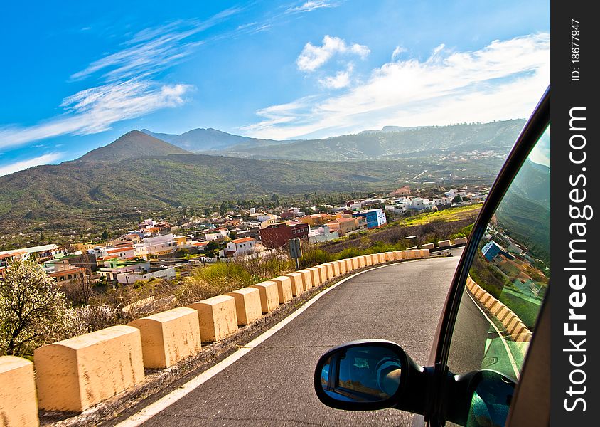 A view from a car of some mountains and houses in Tenerife. A view from a car of some mountains and houses in Tenerife