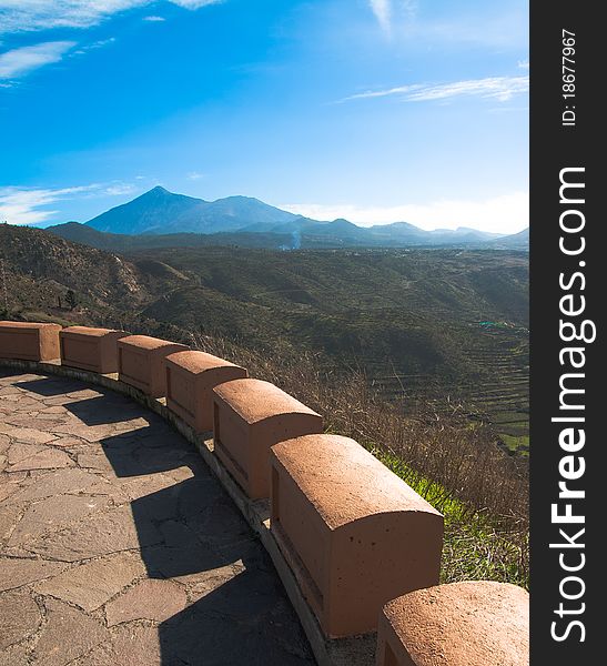 A beautiful landscape of tenerife with stone blocks in the foreground. A beautiful landscape of tenerife with stone blocks in the foreground