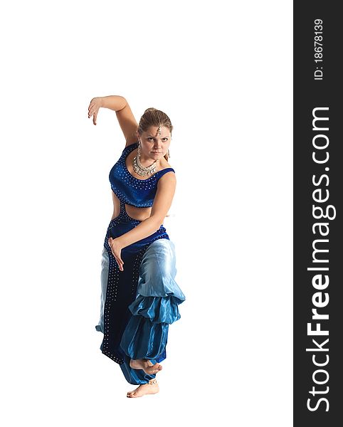 Young woman posing in arabia dance - traditional blue costume. Young woman posing in arabia dance - traditional blue costume