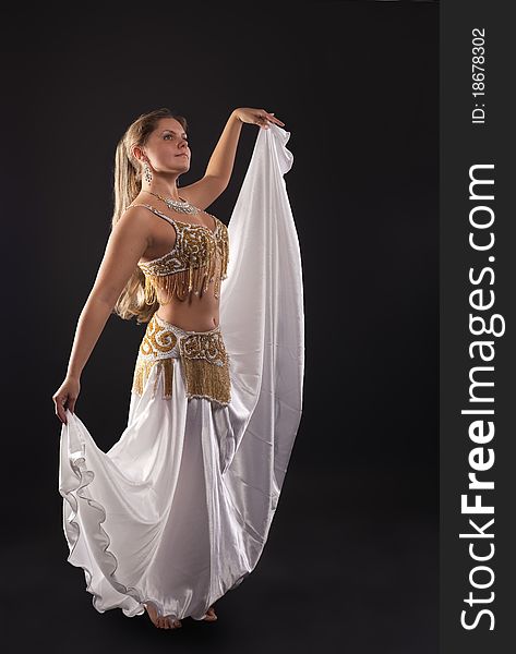 Young Woman Dance In Dark - White Arabian Costume