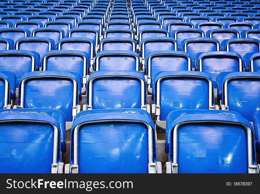 Rows of empty stadium seats