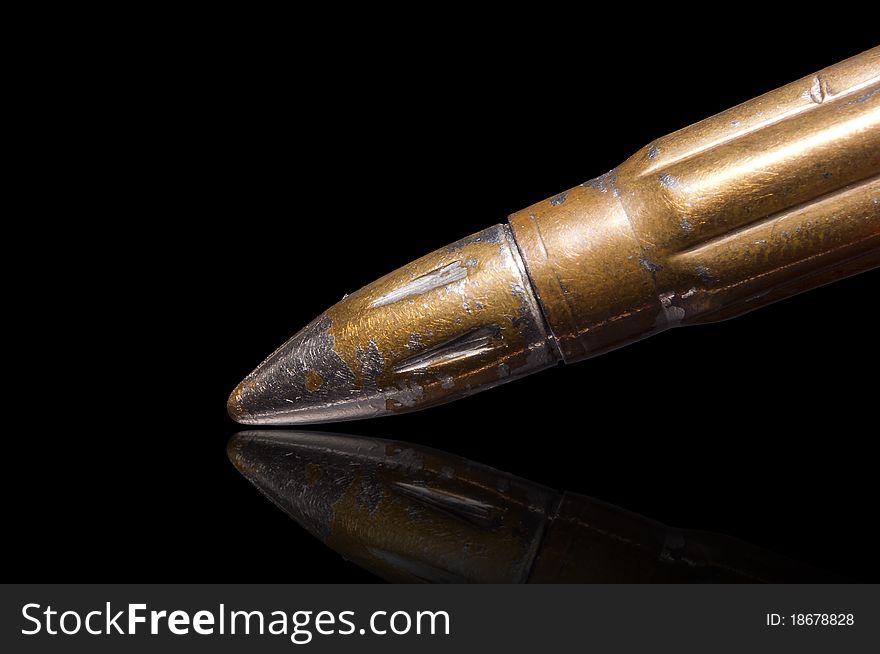 Full metal jacket bullet, isolated over black with clipping path included. Full metal jacket bullet, isolated over black with clipping path included