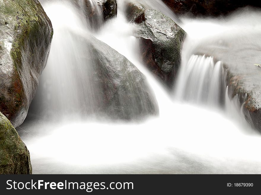 Cascade Falls Over Old Plum River With Rocks