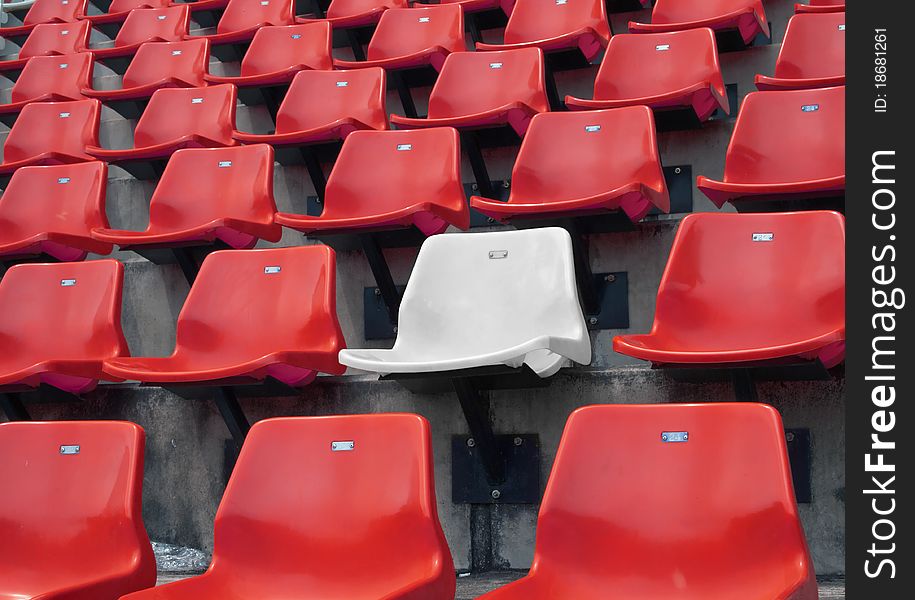 White seats in Red seats on the stadium. White seats in Red seats on the stadium