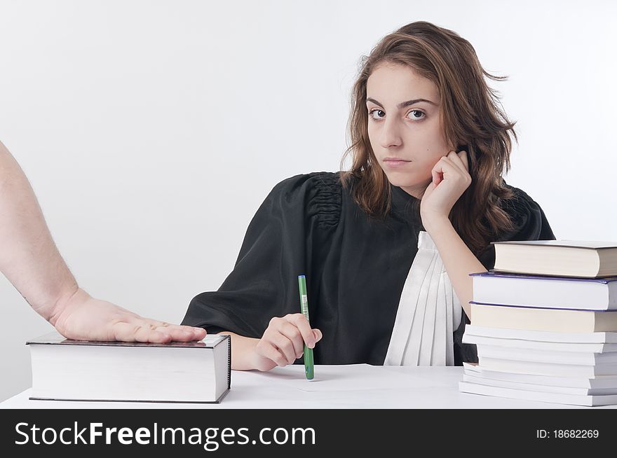 Young law school student listening to the sworn. Young law school student listening to the sworn