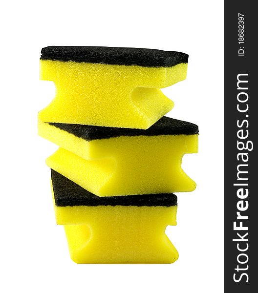 Three yellow cleaning sponges over white