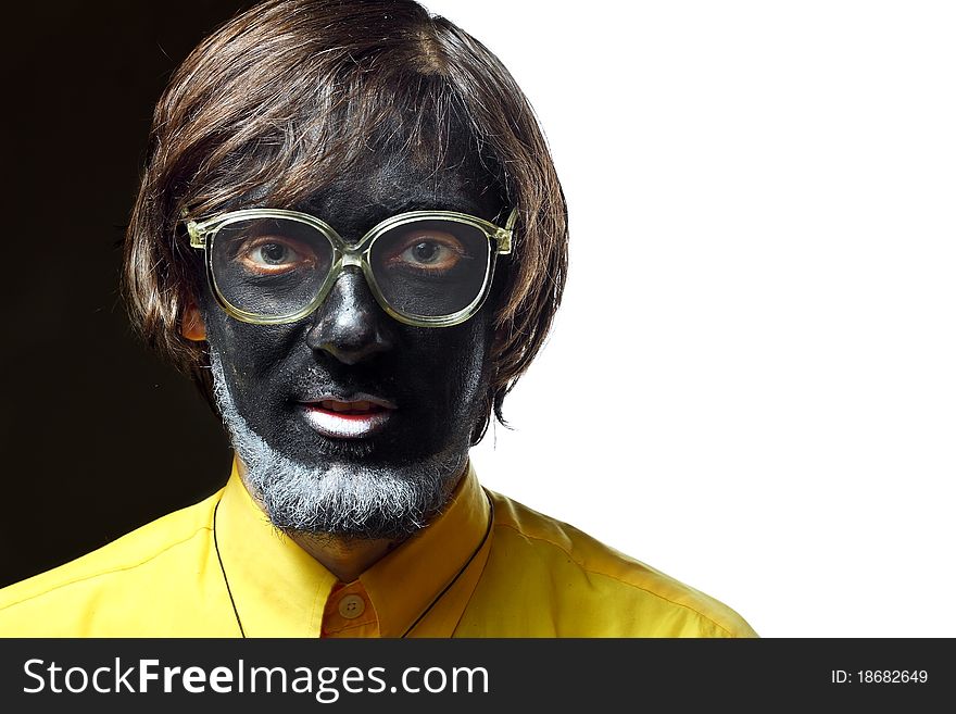 Portrait of a painted young man in studio. Portrait of a painted young man in studio