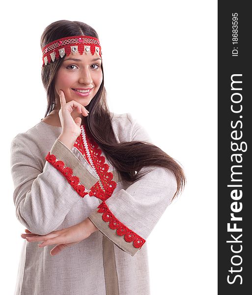 Young girl in dance pose - flax traditional russian costume. Young girl in dance pose - flax traditional russian costume