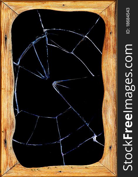 Cracks in the broken dark glass of a window. Cracks in the broken dark glass of a window