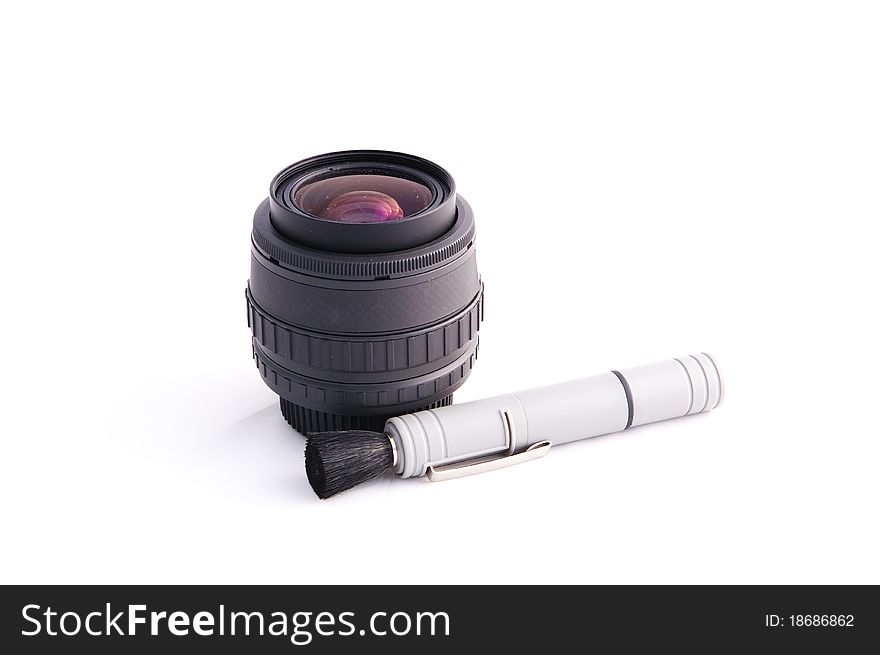 Dirty Lens with Cleaning Tool isolated on a white background