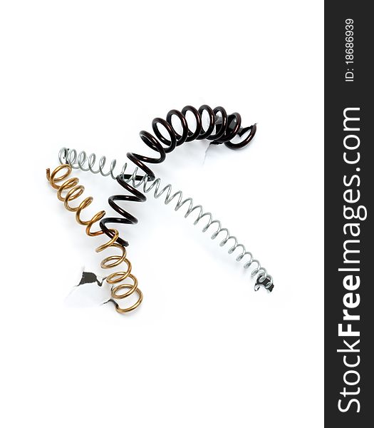 Three metal springs on white disrupt paper background