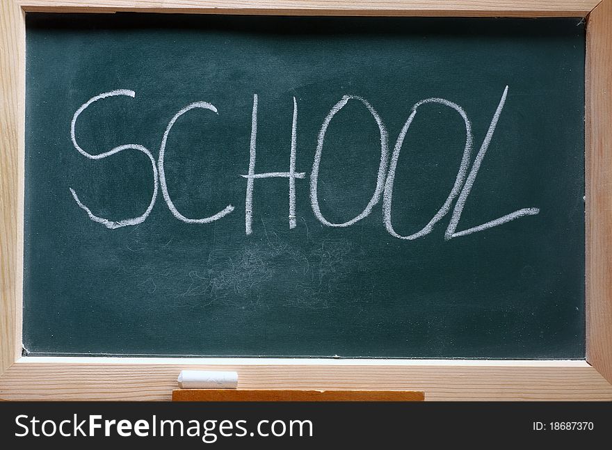 Isolated green blackboard close up