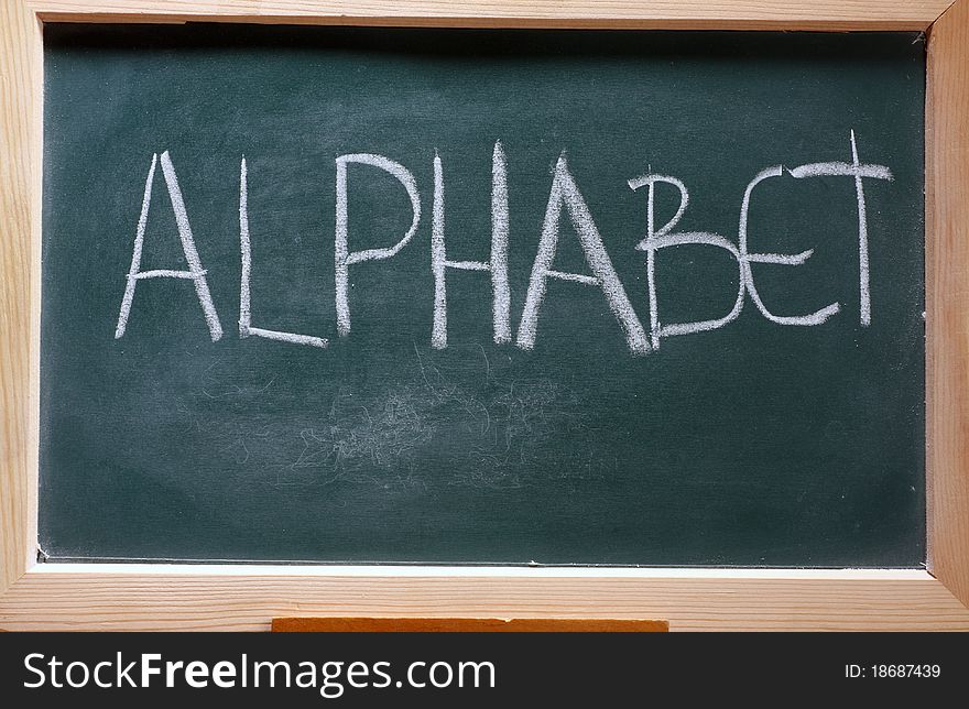 Isolated green blackboard close up