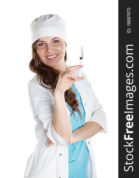 Portrait of a young doctor she smiling and looks into the camera and poses with syringe isolated on white background. Portrait of a young doctor she smiling and looks into the camera and poses with syringe isolated on white background