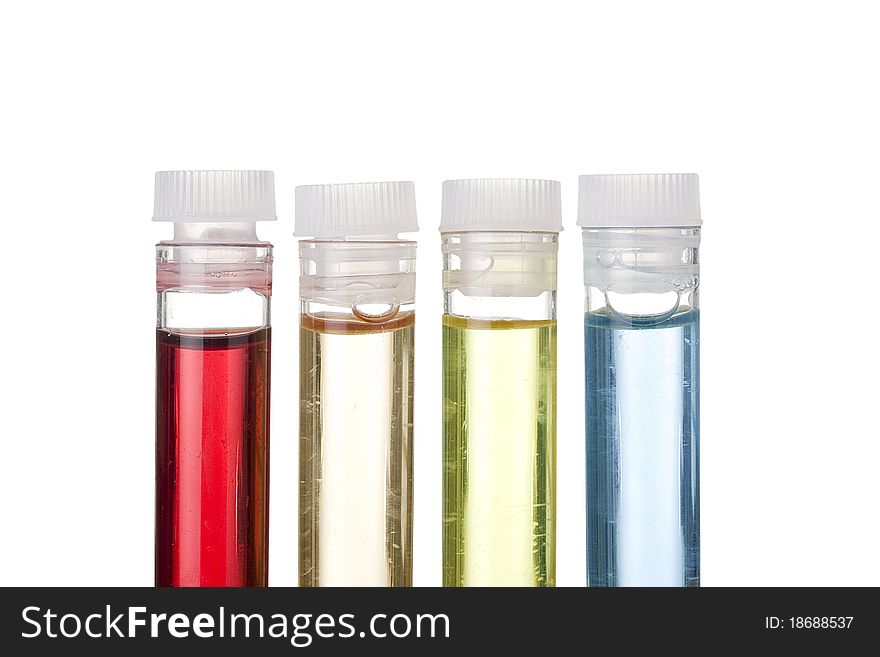 Test tubes with different liquids on a white background. Test tubes with different liquids on a white background.