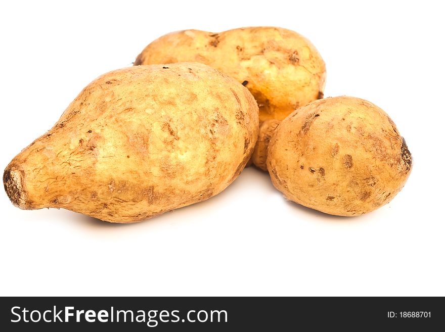 Potatos close up group shot isolated on white.