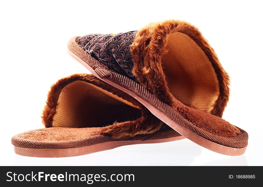 Pair brown slippers. Isolated. photo