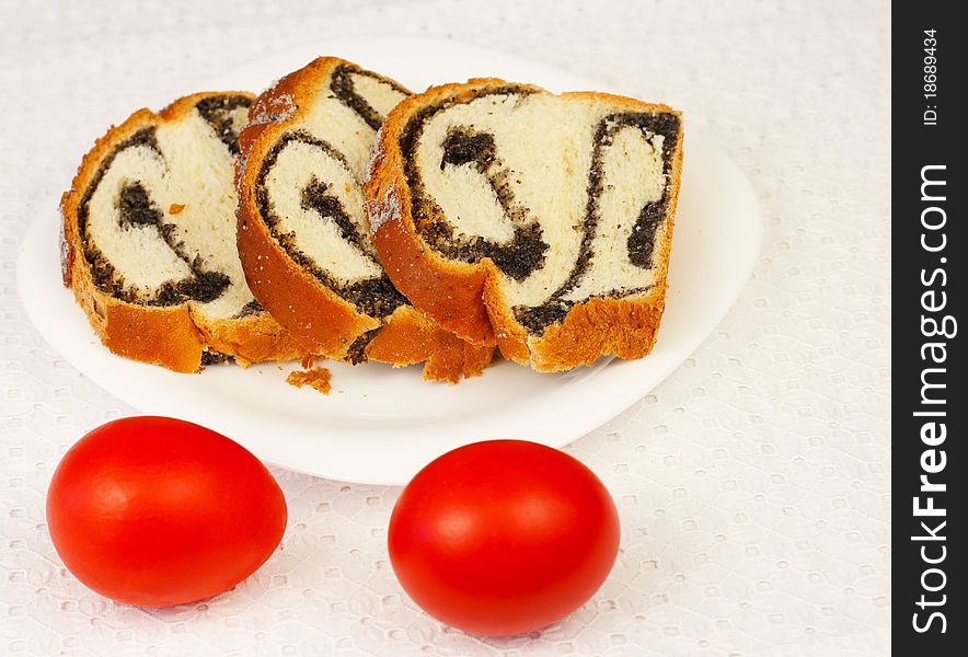 Eggs and sponge cake on white plate