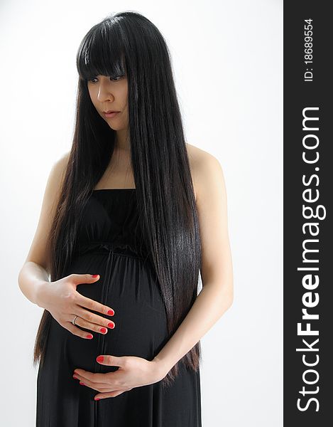 Portrait of asian pregnant woman on white