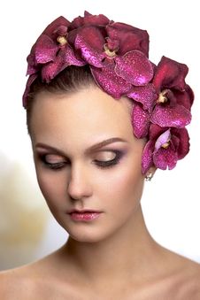 Brunette With Flowers In Her Hair Stock Images