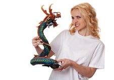 Beautiful Girl With A Wooden Dragon Stock Photography Beautiful Girl With A Wooden Dragon Stock Photography
