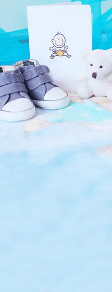 Baby Shoes And Teddy Bear In Blue Royalty Free Stock Images Baby Shoes And Teddy Bear In Blue Royalty Free Stock Images