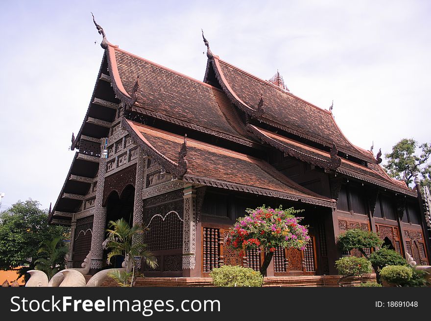 Thai temples, surrounded by flowers varieties. Thai temples, surrounded by flowers varieties