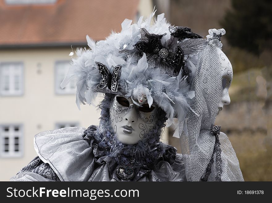 Portrait of Girl wearing Venetian Mask