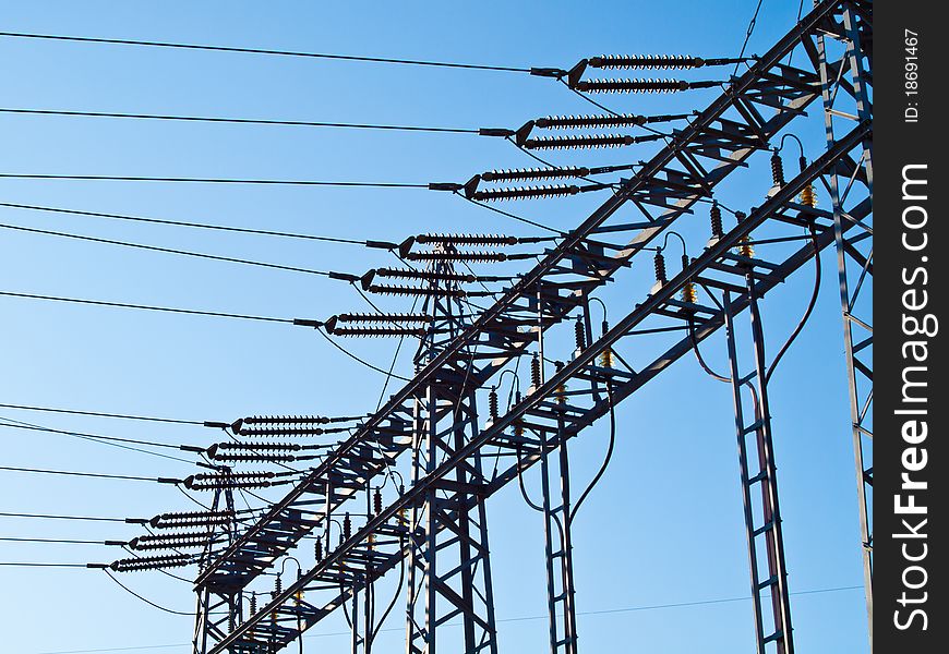 Electricity Pylon with clear blue sky in the background
