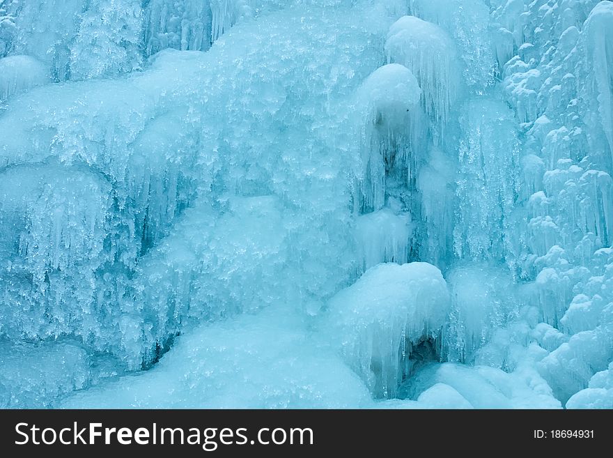 Icicles of frozen waterfall