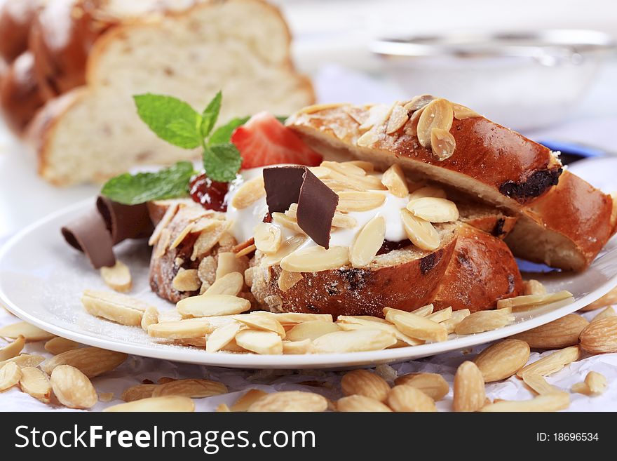 Sweet bread with jam, cream cheese and almonds. Sweet bread with jam, cream cheese and almonds
