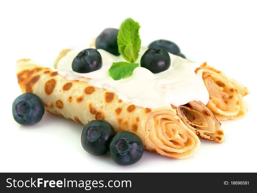 Fritters with fresh berries and mint. Fritters with fresh berries and mint