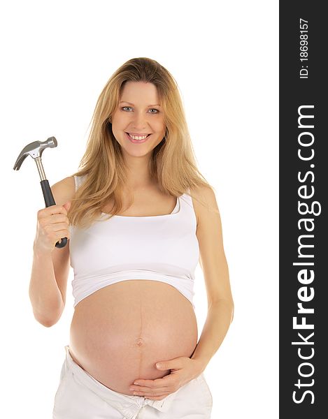 Happy pregnant woman with a hammer