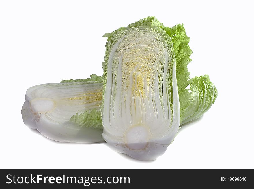 Cut half of the cabbage on a white background