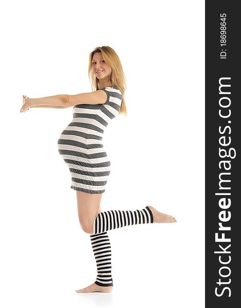 Happy pregnant woman in a striped dress