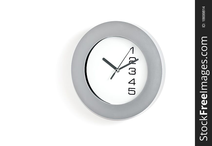 Grey and white wall clock on white background.