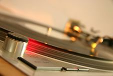 Red Strobe Light On A Silver DJ Turntable Royalty Free Stock Photos Red Strobe Light On A Silver DJ Turntable Royalty Free Stock Photos