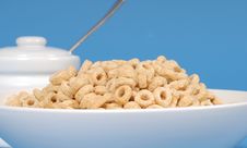 Bowl Of Oat Cereal With Sugar Bowl On Blue Background Royalty Free Stock Images Bowl Of Oat Cereal With Sugar Bowl On Blue Background Royalty Free Stock Images