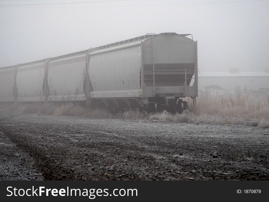 Railroad Cars In Fog