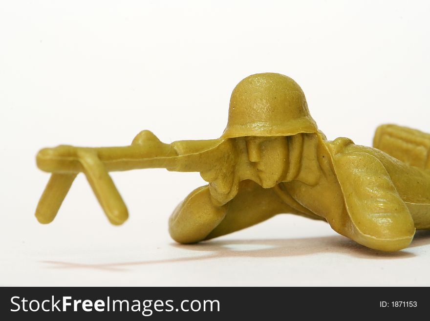 A firing toy soldier figure.