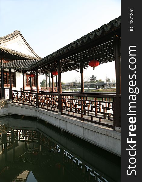 Chinese traditional garden with lake,  pavilion, long gallery. Chinese traditional garden with lake,  pavilion, long gallery