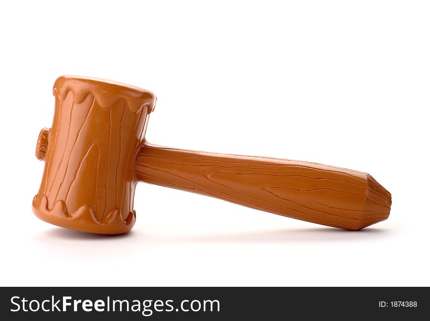 A brown plastic toy gavel