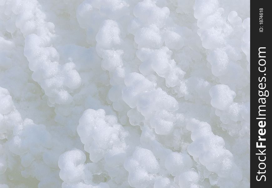 Icicles and the crystals of the sparkling ice formed by frozen water, falling from above. Icicles and the crystals of the sparkling ice formed by frozen water, falling from above