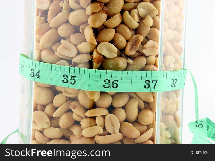 Peanuts in a Jar with Tape measure around the Jar