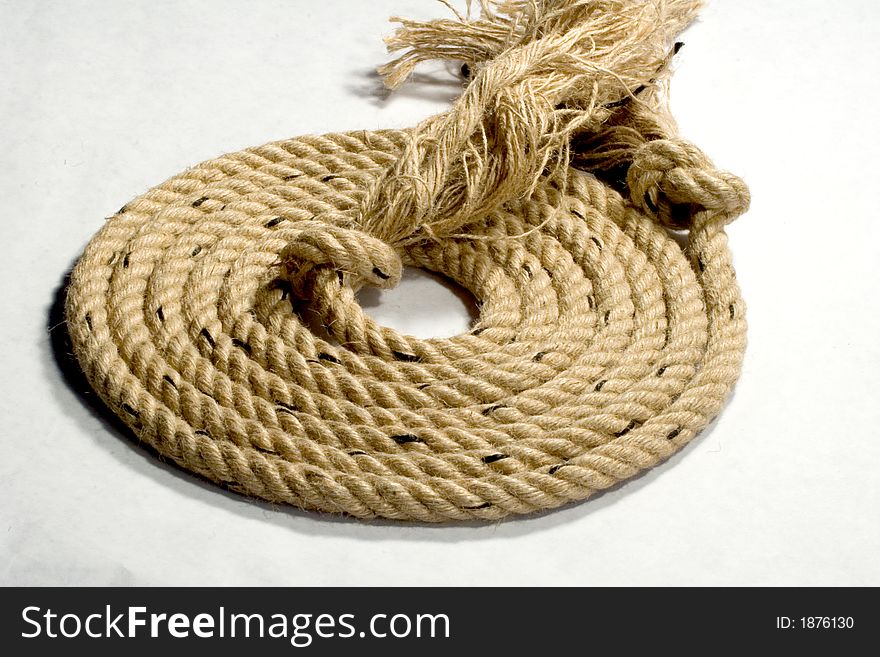 Convoluted boat rope on white background