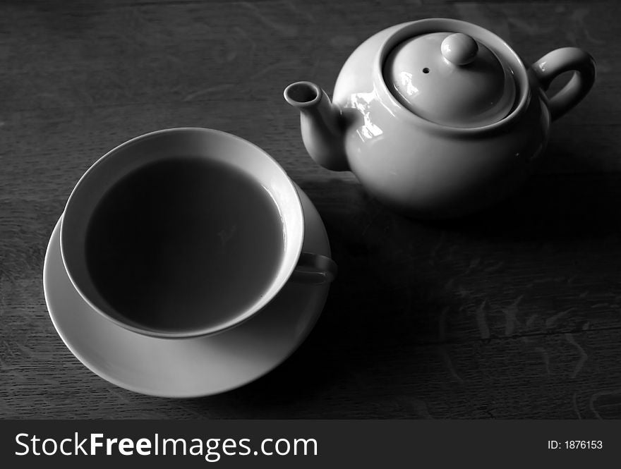 Cup of tea and a teapot