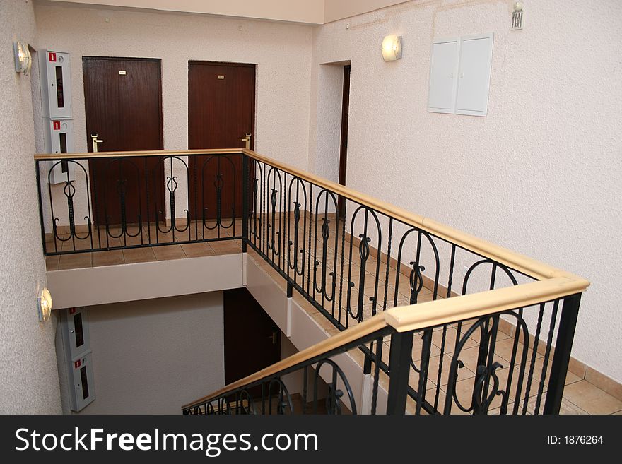 Hotel stair resting place with doors