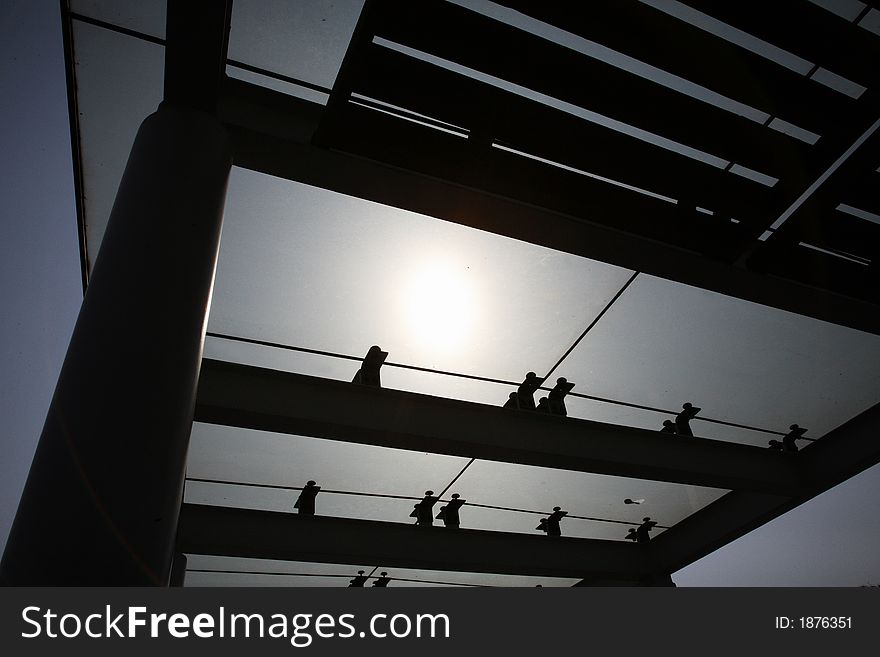 Glass roof with the sun in the background