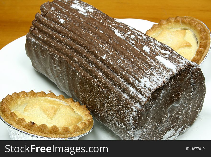 Chocolate yulelog and fruit pies for a treat