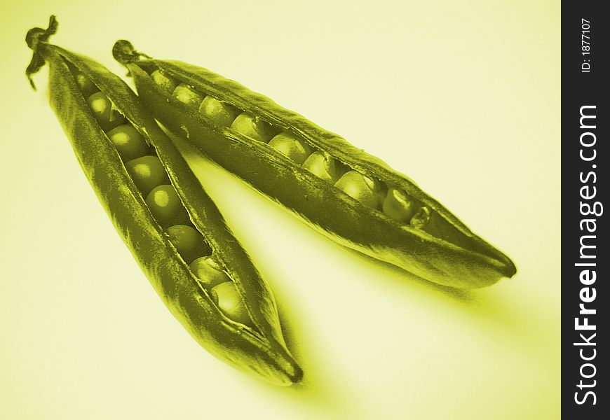 Peapod split open revealing peas